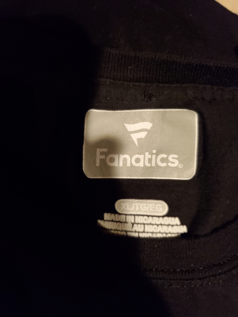 Fanatics Black Tee with Silver-Gray Logo Tag